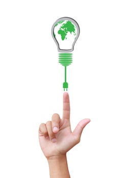 green eco energy concept, plant growing on light bulb photo