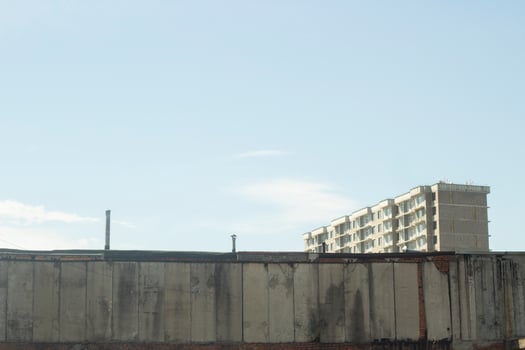 Old building in city. Industrial area. Details of industrial-looking architecture. photo