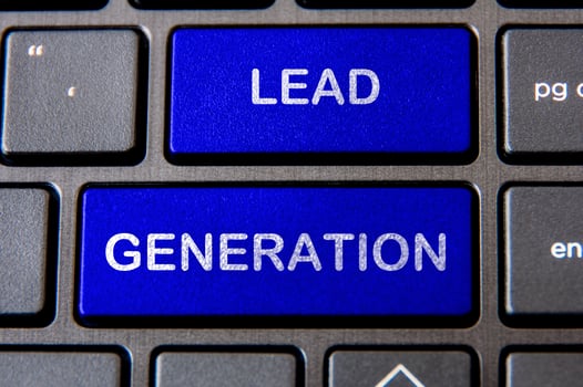 Online business and list building concept - Laptop keyboard with blue Lead Generation button. photo