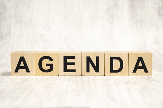 Agenda word made with wooden cubes in row photo