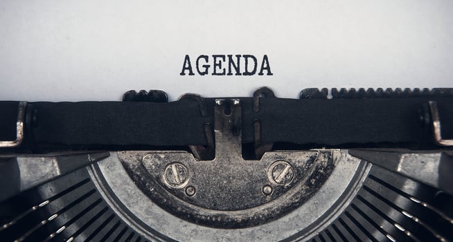 Agenda text typed on an old vintage typewriter. Conceptual photo