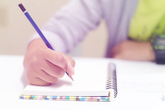 front view of writing hand photo