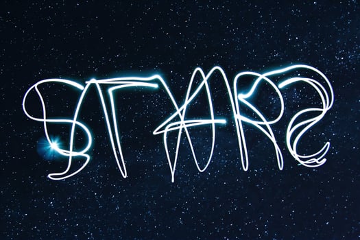 Word STARS on the night sky photo