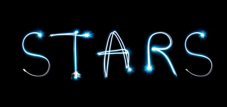Word STARS on the night sky photo