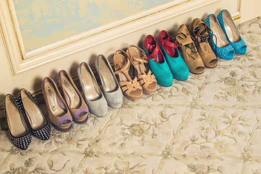 Different female shoes on high heels photo