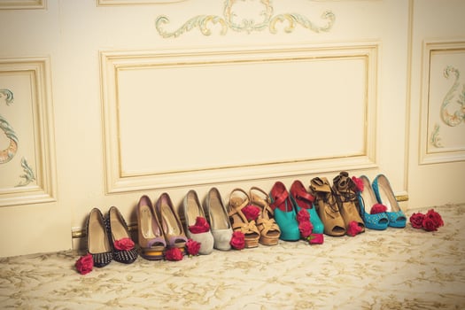 Different female shoes on high heels photo