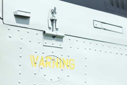 Danger warning sign decal on an old aircraft. photo