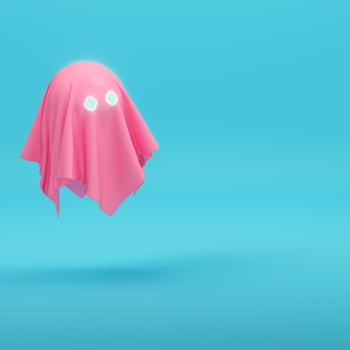 Pink cute ghost chsracter on bright blue background in pastel colors photo