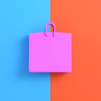 Pink shopping bag on bright blue orange background photo