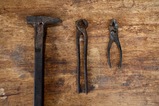 Old tools on a wooden table photo