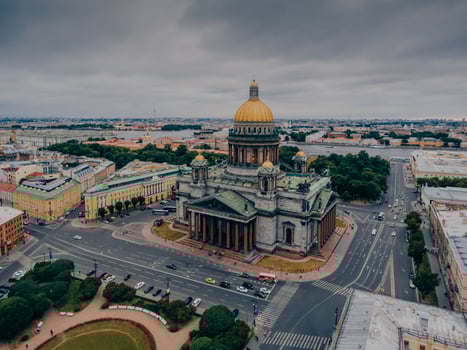 Cityscape with cloudy sky. St Isaacs Cathedral in morning. View from roof. Petersburg museum. Aleksandrovskiy Garden and Admiralteystvo photo
