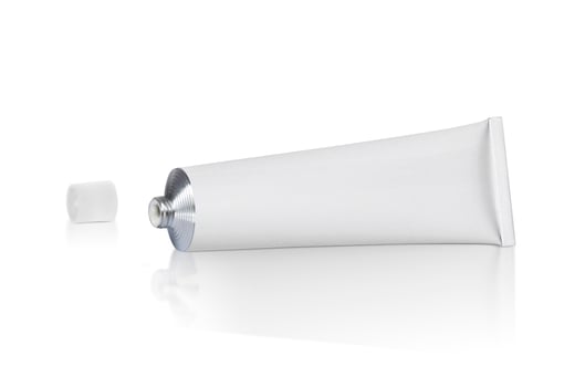 open blank white tube isolated on a white background photo