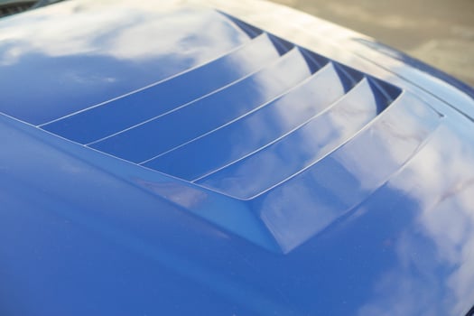 Spoiler on car. Blue hood. Transport details. photo