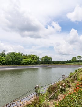 Small reservoir with black plastic sheet. photo