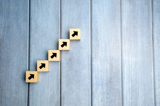 wooden blocks stacking as step stair with arrow up, Business growth success process concept, copy space photo