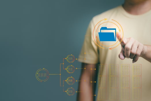 Young businessman pointing finger at Icon , photo