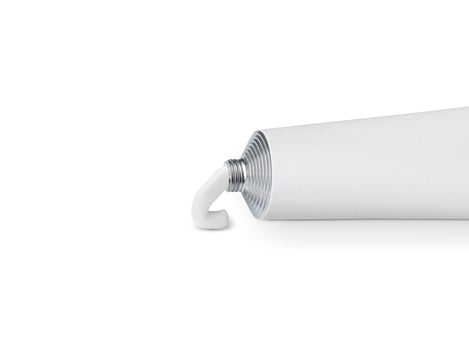 white tube with ointment isolated on a white background photo