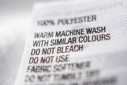 Polyester fabric Clothing label with laundry instructions photo