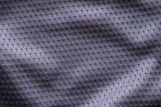 Gray fabric sport clothing football jersey with air mesh texture background photo