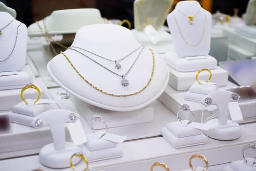 jewelry diamond shop with rings and necklaces luxury retail store window display photo