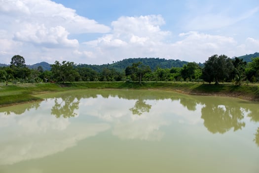 Small reservoir for water retention to use in the countryside farm. photo