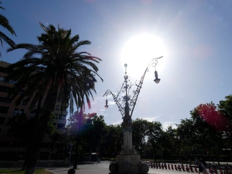 backlit details of a modernist chandelier in the city of Barcelona photo