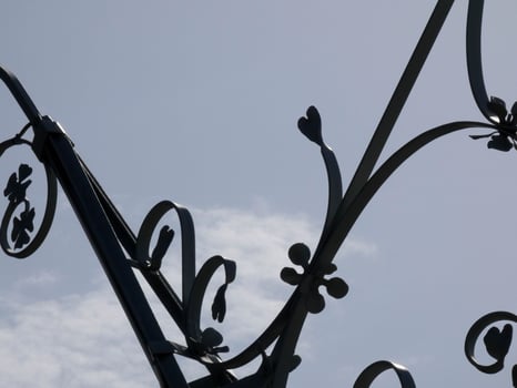 backlit details of a modernist chandelier in the city of Barcelona photo