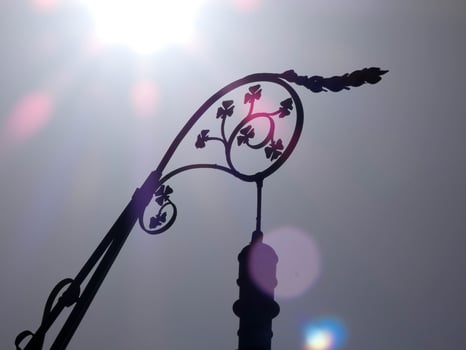 backlit details of a modernist chandelier in the city of Barcelona photo