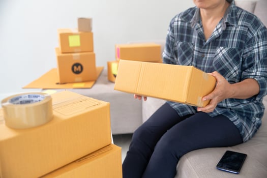 Women working freelance and packing box photo