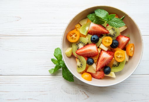 Healthy fresh fruit salad in a bowl photo