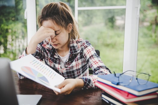 woman stress from work overload photo