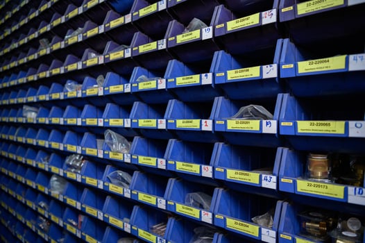 Small blue electronic component storage compartment. systematically stored photo