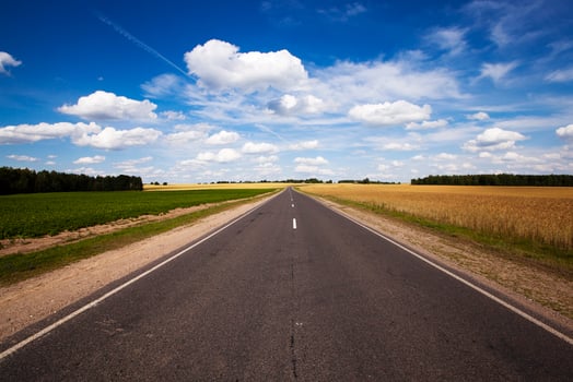 a road with an asphalt surface for traffic photo
