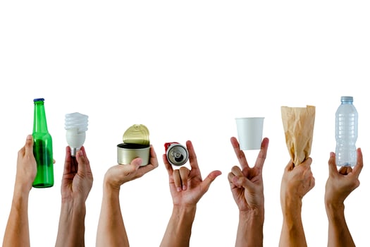 Hands holding and show recycle materials on white background. photo