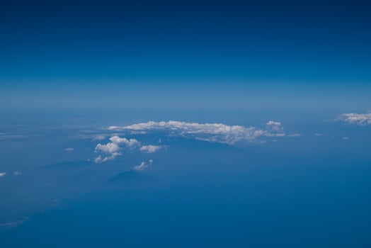 blue sky and clouds on plane photo