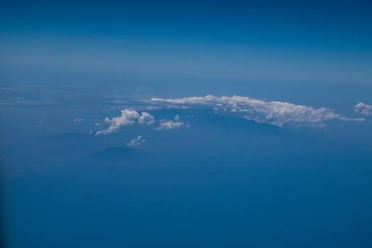 blue sky and clouds on plane photo