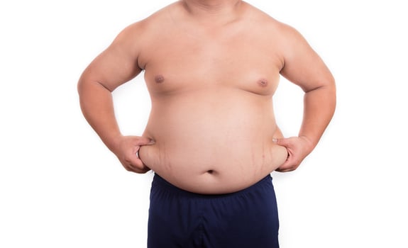 Fat man with a big belly. Diet photo