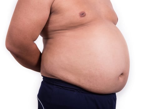 Fat man with a big belly. Diet photo