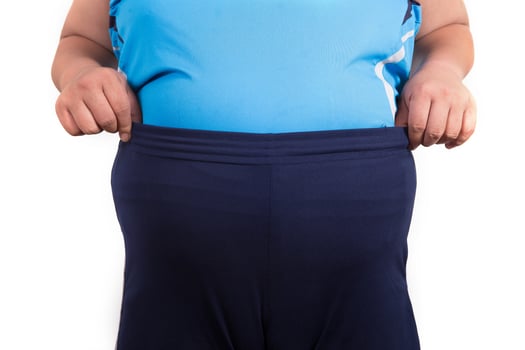 Fat man with a big belly. Diet photo