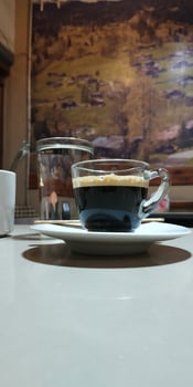 espresso coffee with a small glass photo