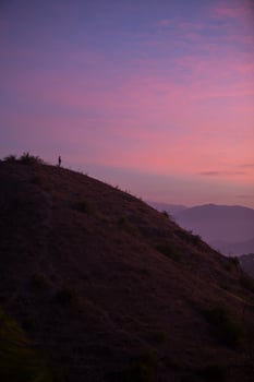 Fog mountain in the early morning sunrise photo