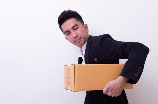 Shop assistant brings the parcel, isolated, white background photo