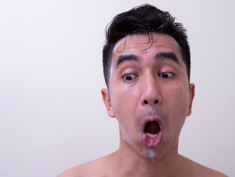 Asian men are washing their face with foam , Men skin care concept photo