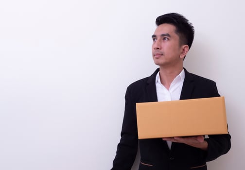 Shop assistant brings the parcel, isolated, white background photo