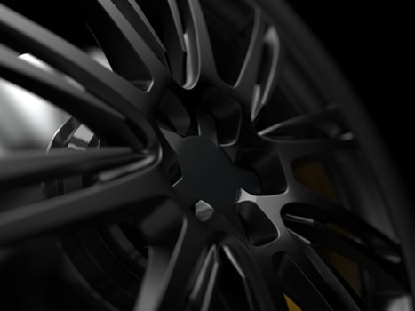 auto wheel with chrome disks close-up on a dark background. 3d render photo
