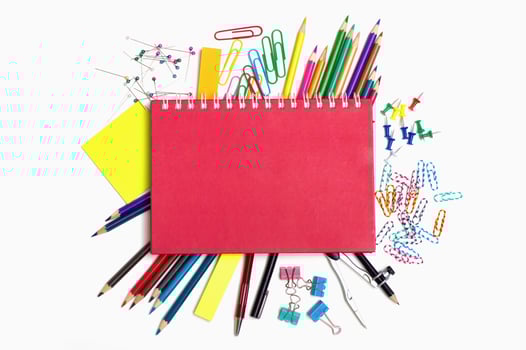 School and office supplies on white background photo