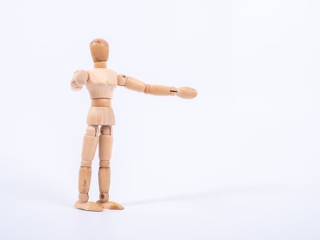 Wooden dummy isolated on white background photo