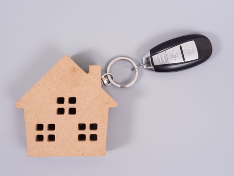 Single house on money. Concept of real estate photo