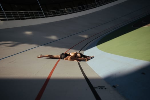Young attractive female fitness woman performing a twine photo
