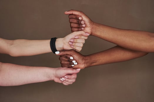 We can do it. Side view of women's hands in gesture. Conception of success photo